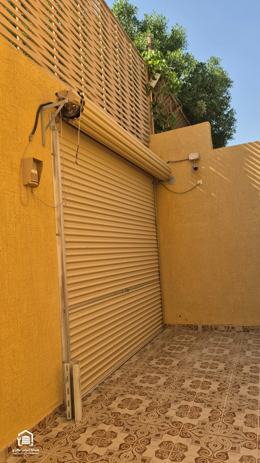 مشروع تركيب وصيانة أبواب الكراج رقم 26 بالرياض