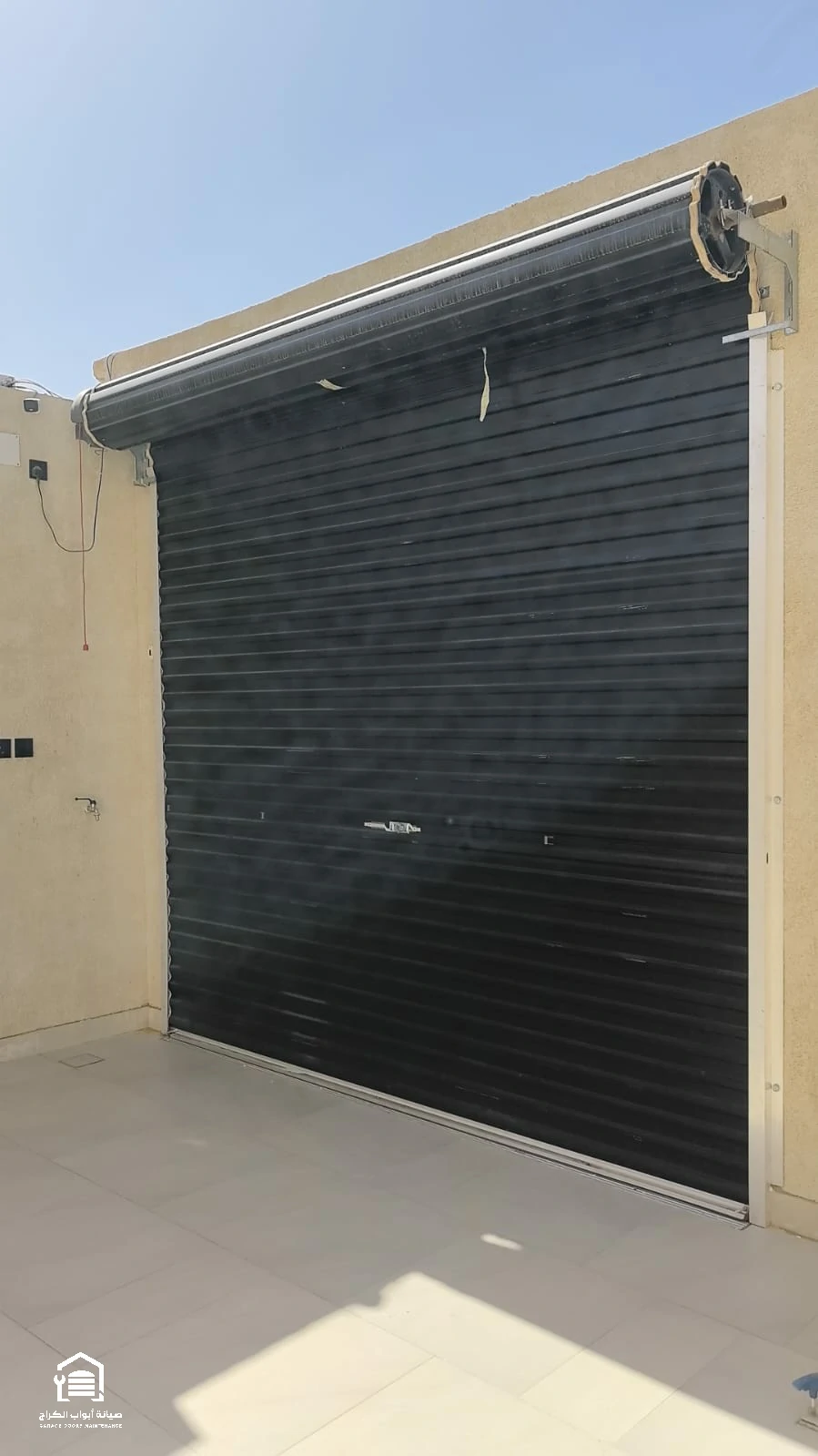 مشروع تركيب وصيانة أبواب الكراج رقم 33 بالرياض